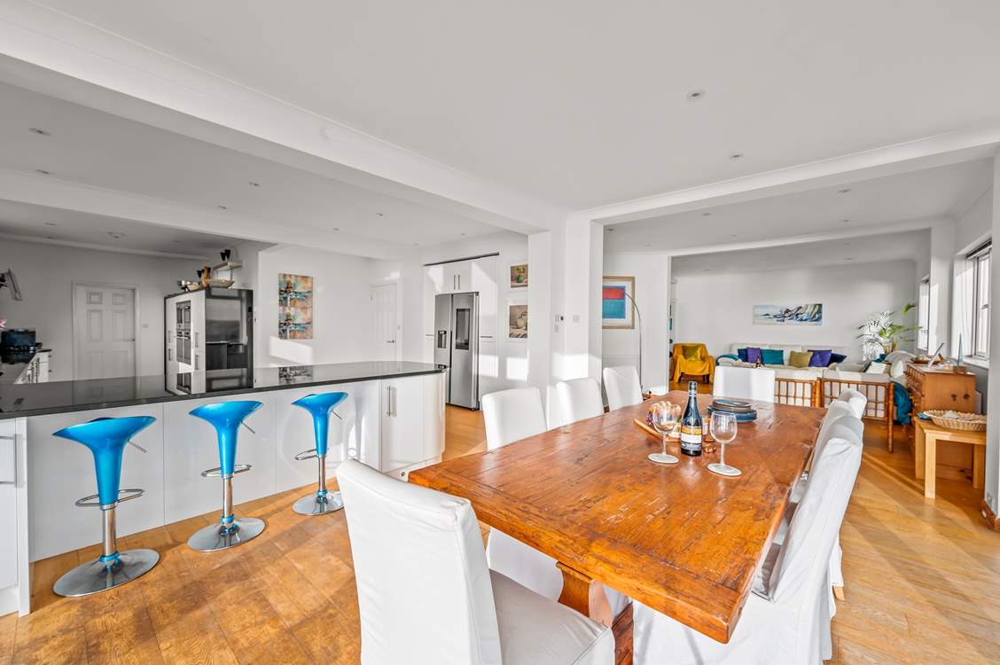 The open plan aspect of this house makes playing, dining and relaxing together so easy to do.