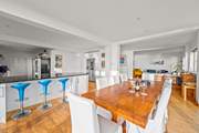 The open plan aspect of this house makes playing, dining and relaxing together so easy to do.