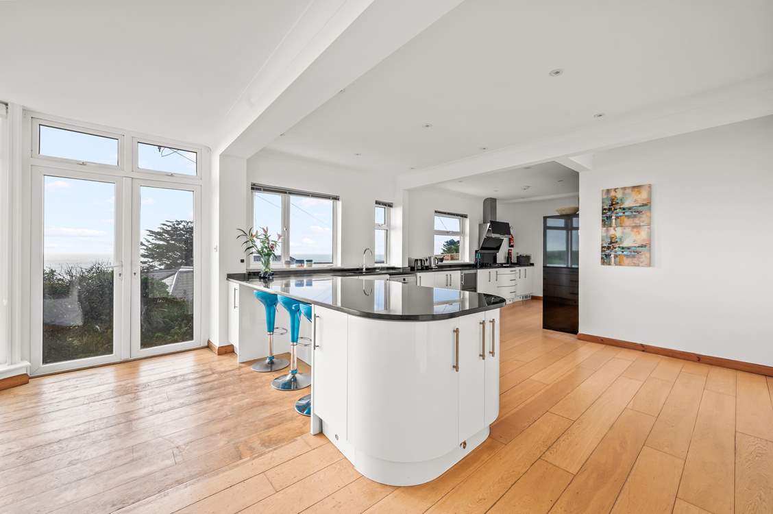 Step out of the kitchen, down a few steps onto the raised patio area.