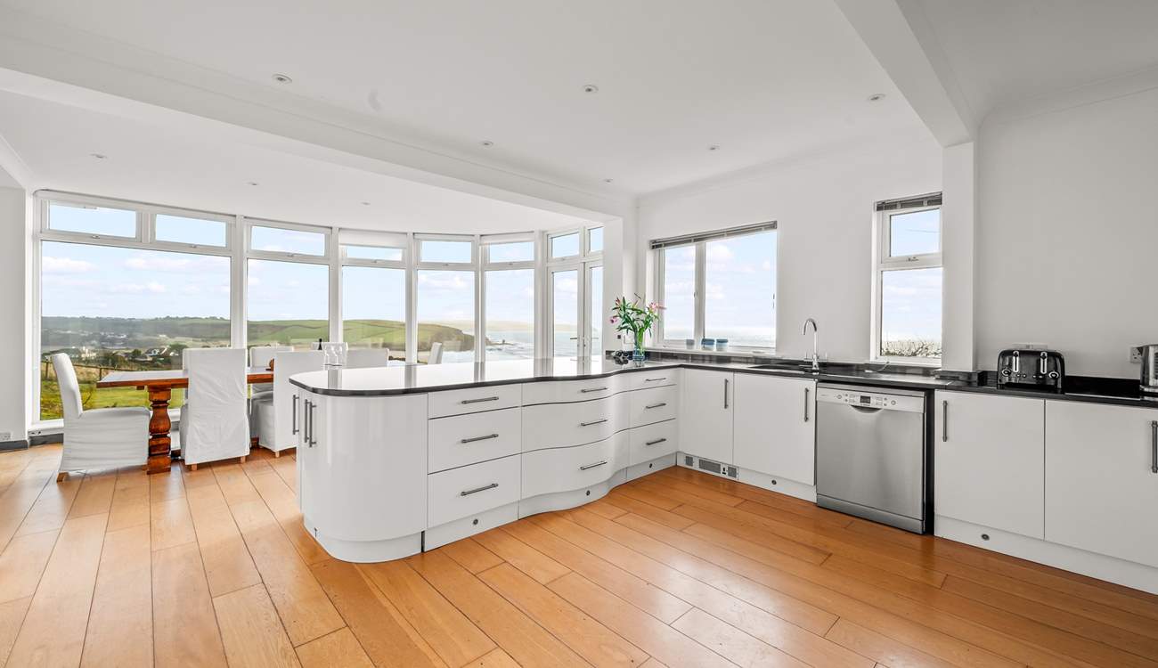 Oodles of space and work surfaces for chef to work with, not forgetting that fabulous view.