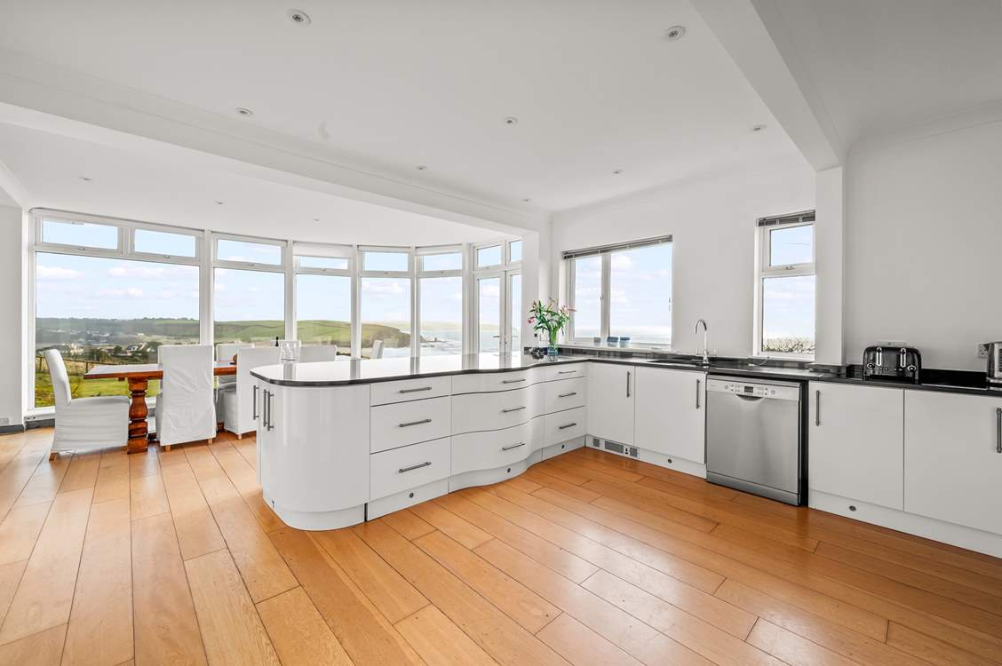 Oodles of space and work surfaces for chef to work with, not forgetting that fabulous view.