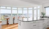 The kitchen and dining space have the most incredible views out to sea. - Thumbnail Image