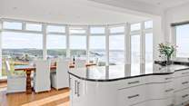 The kitchen and dining space have the most incredible views out to sea.