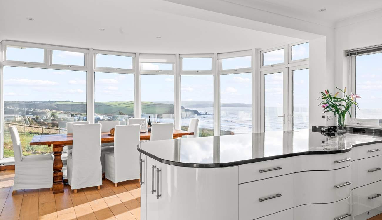 The kitchen and dining space have the most incredible views out to sea.