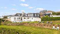 What a fabulous house. Perfect for a large family or friends gathering.
Due to the numerous slopes and steps spread across the three tiers of lawn, please don't leave young children unattended.