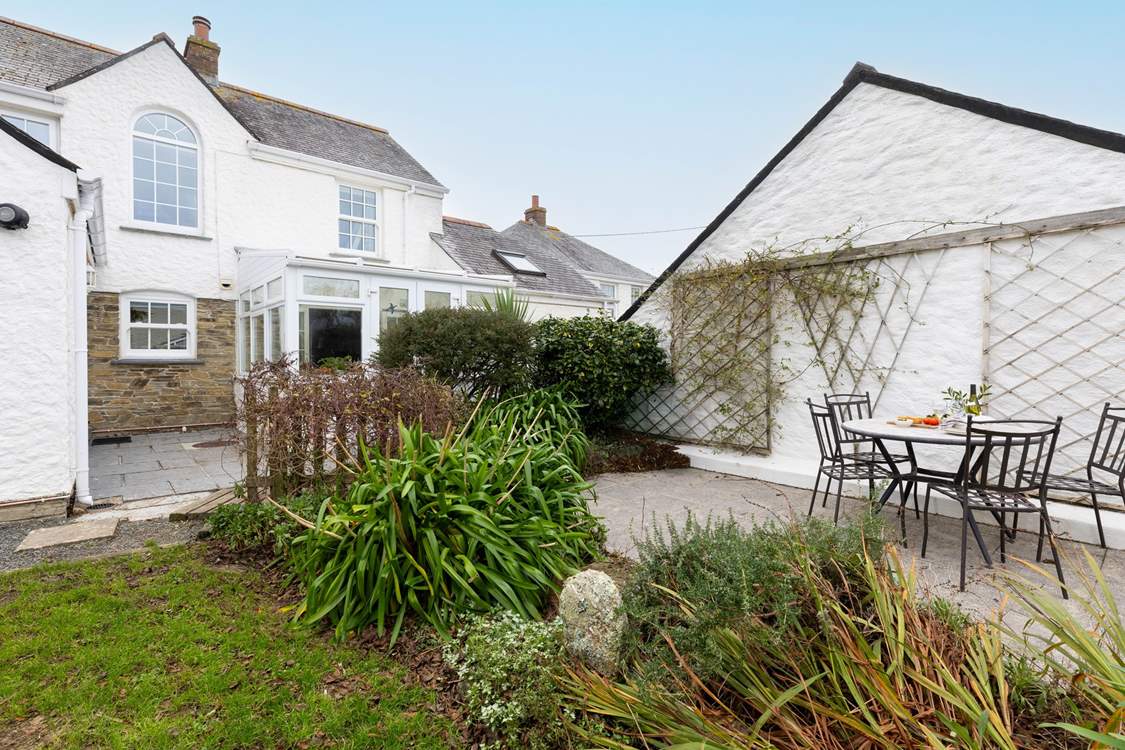 The patio is close to the main house.