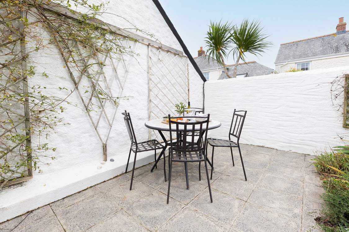 Enjoy al fresco dining on the secluded patio.