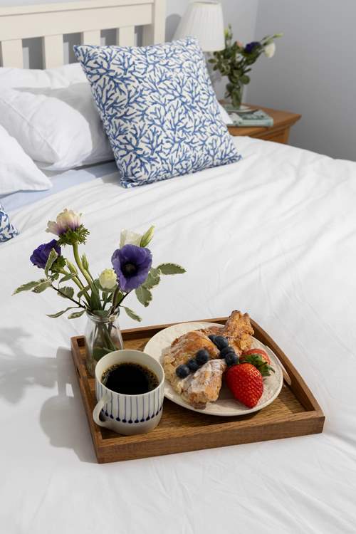 Breakfast in bed? Why not, you are on holiday.