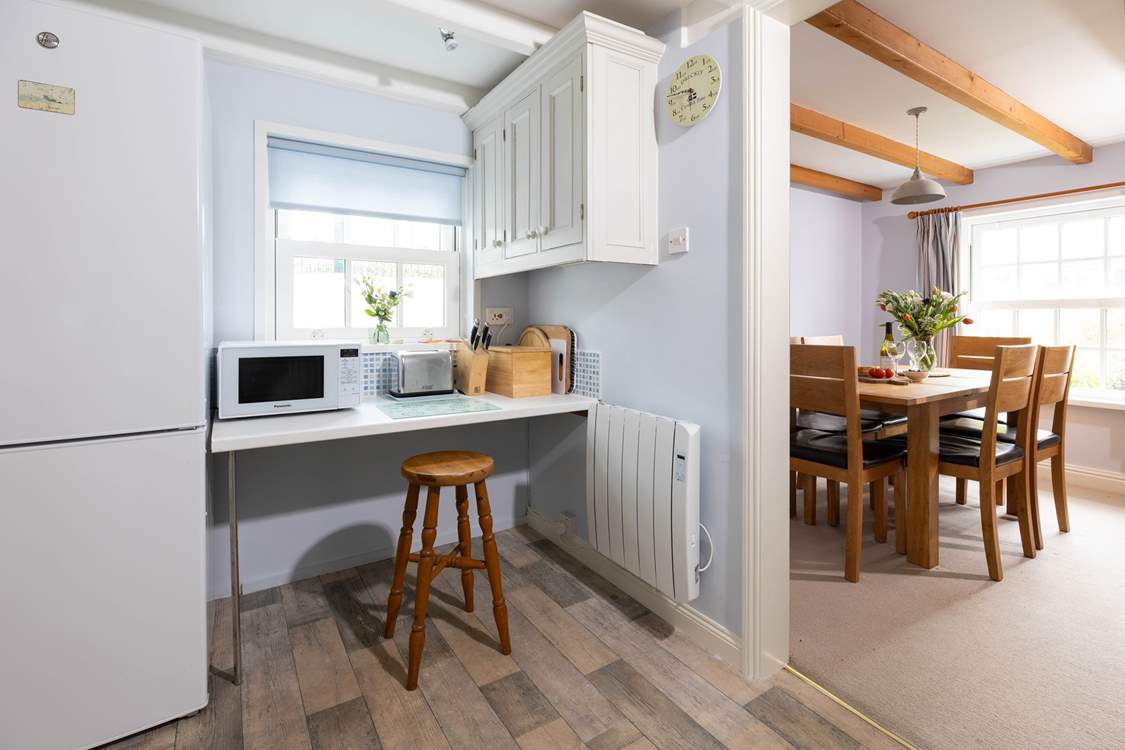 The dining-room leads off the kitchen.