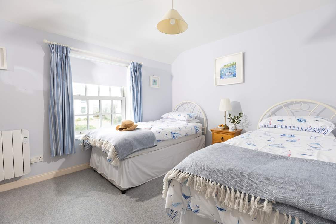 Pretty as a picture, the twin bedroom.