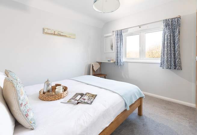 Bedroom 4, a king room with rural views. 