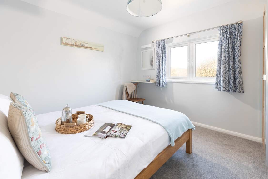 Bedroom 4, a king room with rural views.