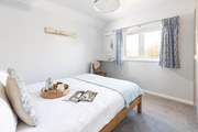 Bedroom 4, a king room with rural views.