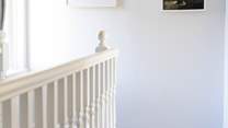Colourful seaside art throughout the house. 