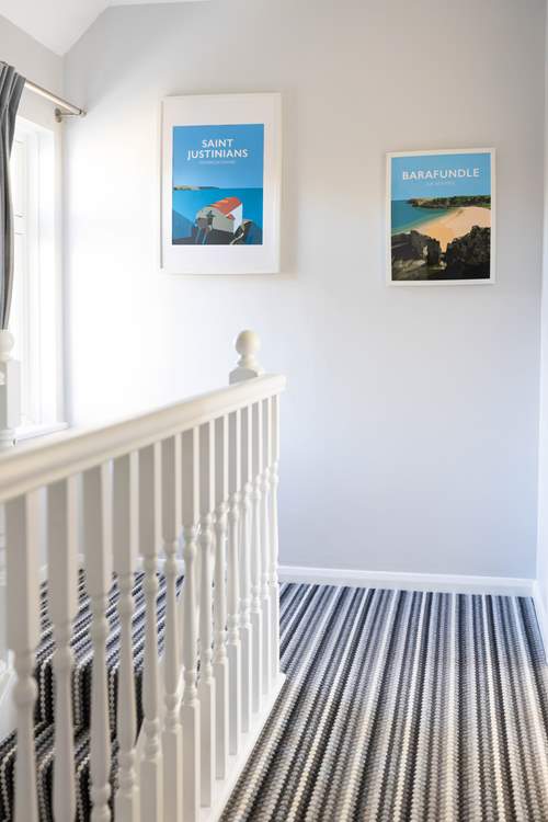 Colourful seaside art throughout the house.