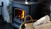 On chilly nights relax in the warm glow of the wood-burner. 