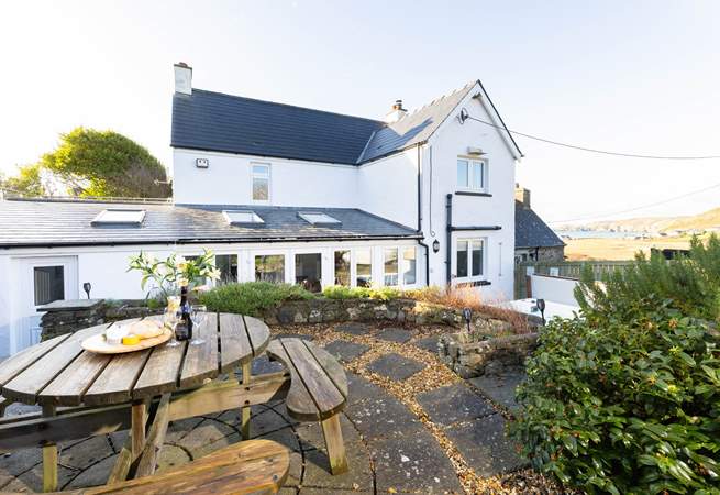 Soak up the sea air and the beauty of your surroundings from spellbinding Newgale Beach Cottage. The blissful hot tub awaits. 