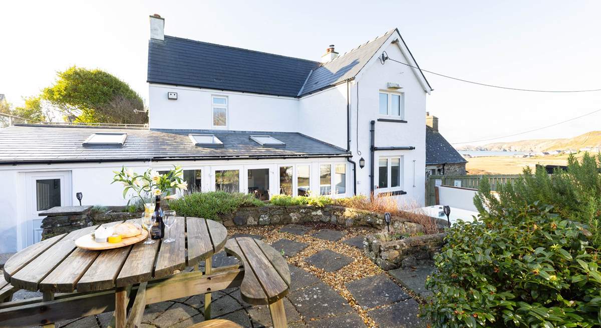 Soak up the sea air and the beauty of your surroundings from spellbinding Newgale Beach Cottage. The blissful hot tub awaits. 