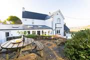 Soak up the sea air and the beauty of your surroundings from spellbinding Newgale Beach Cottage. The blissful hot tub awaits.