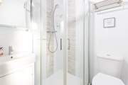 Tasteful en suite shower-room.
