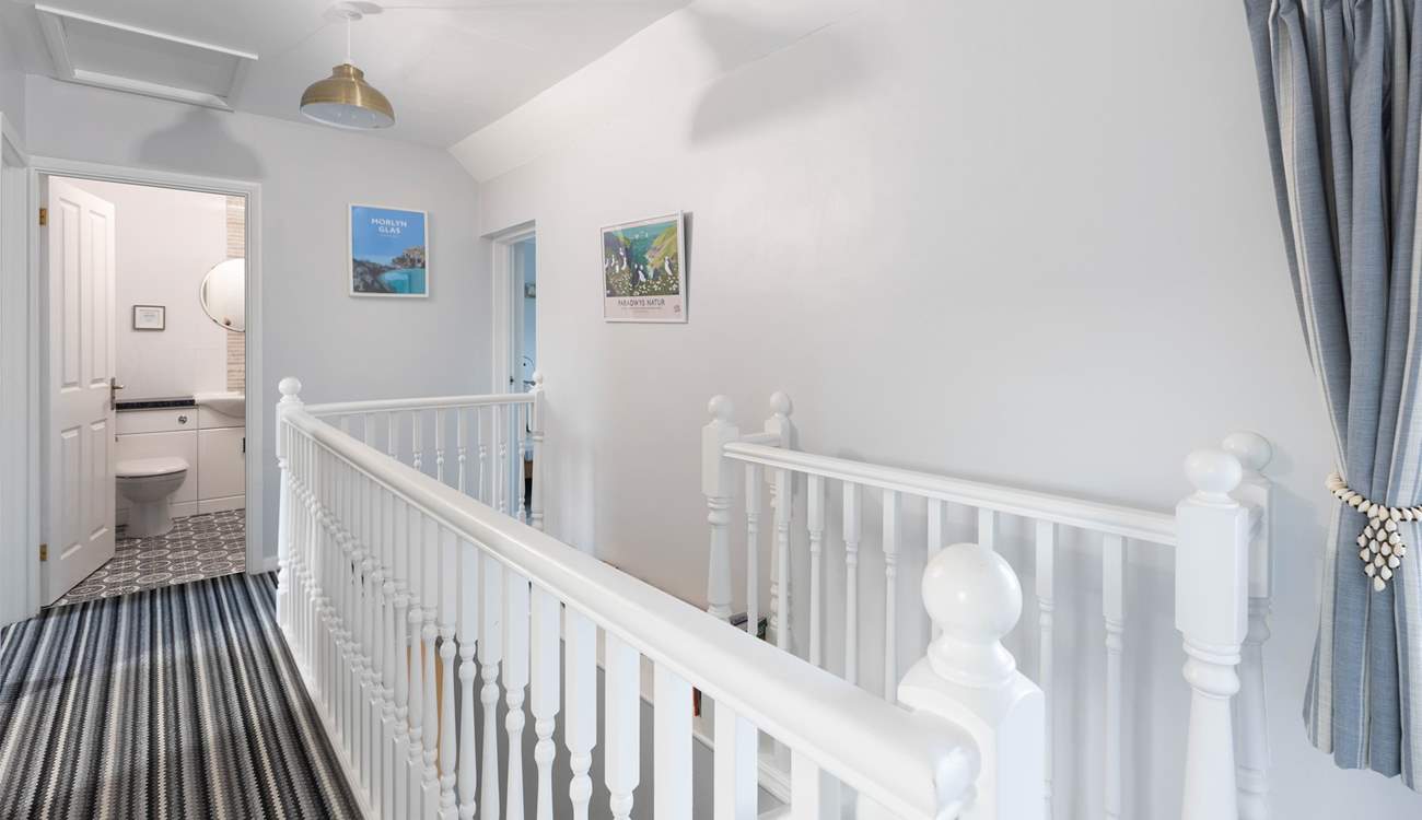 You'll find the four bedrooms on the first floor. 