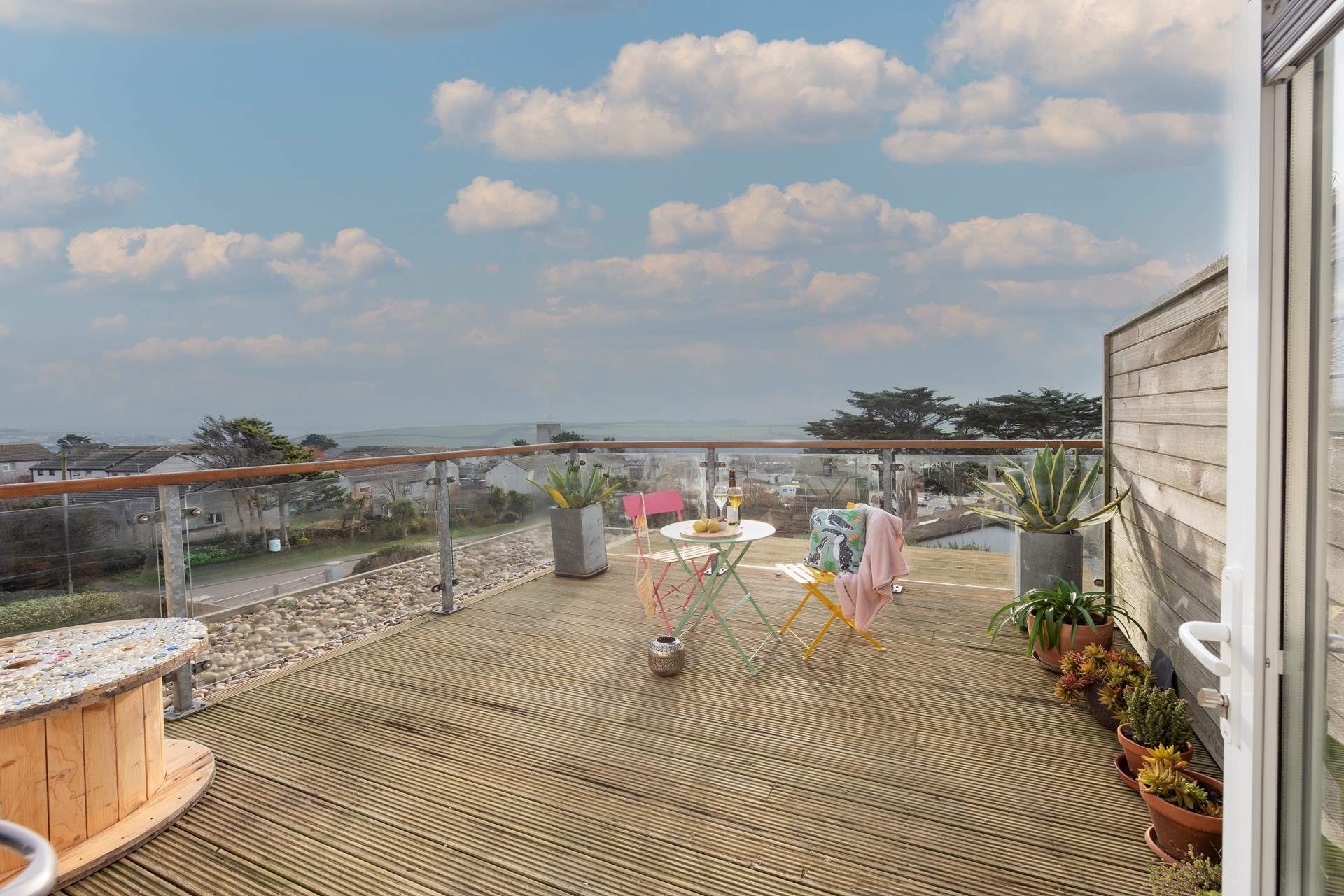 Enjoy long evenings on the sunny terrace overlooking the Cornish countryside. 