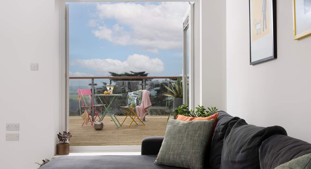 Step up to the large roof terrace from the open plan living space. 