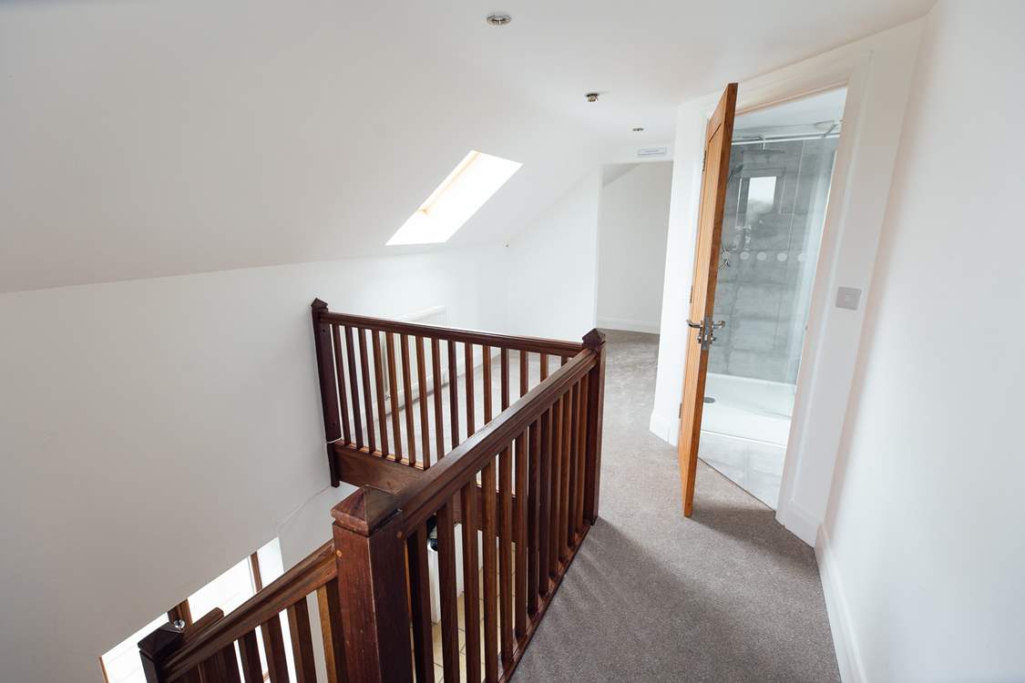 When it's time to climb the wooden hill, three bedrooms and the family bathroom are found on the first floor.