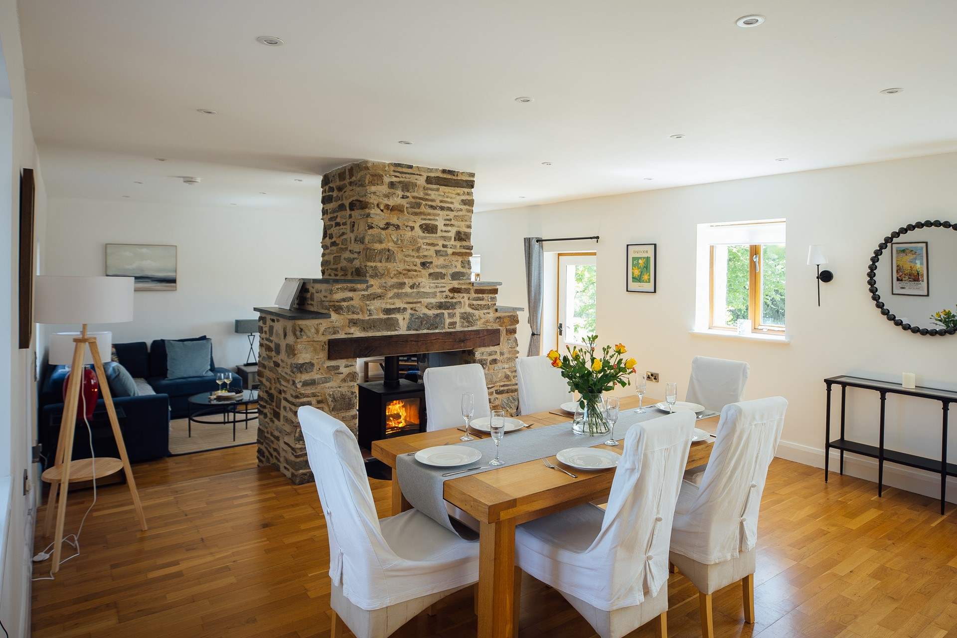 Ideal for socialising, the spacious open plan design with double sided wood-burner. 