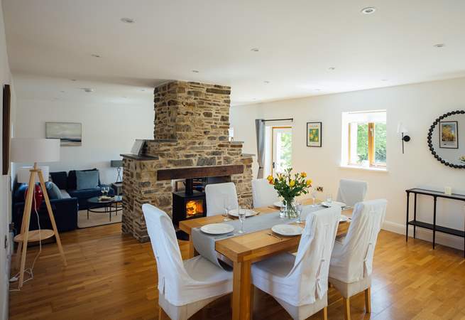 Ideal for socialising, the spacious open plan design with double sided wood-burner. 