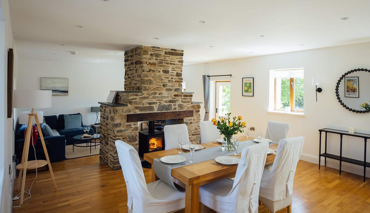Ideal for socialising, the spacious open plan design with double sided wood-burner. 