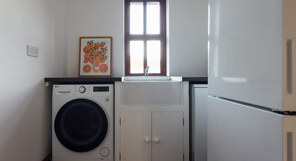 Useful utility-room with washing machine, off the boot room. A handy space for dog care, buckets and spades or muddy walking boots. 