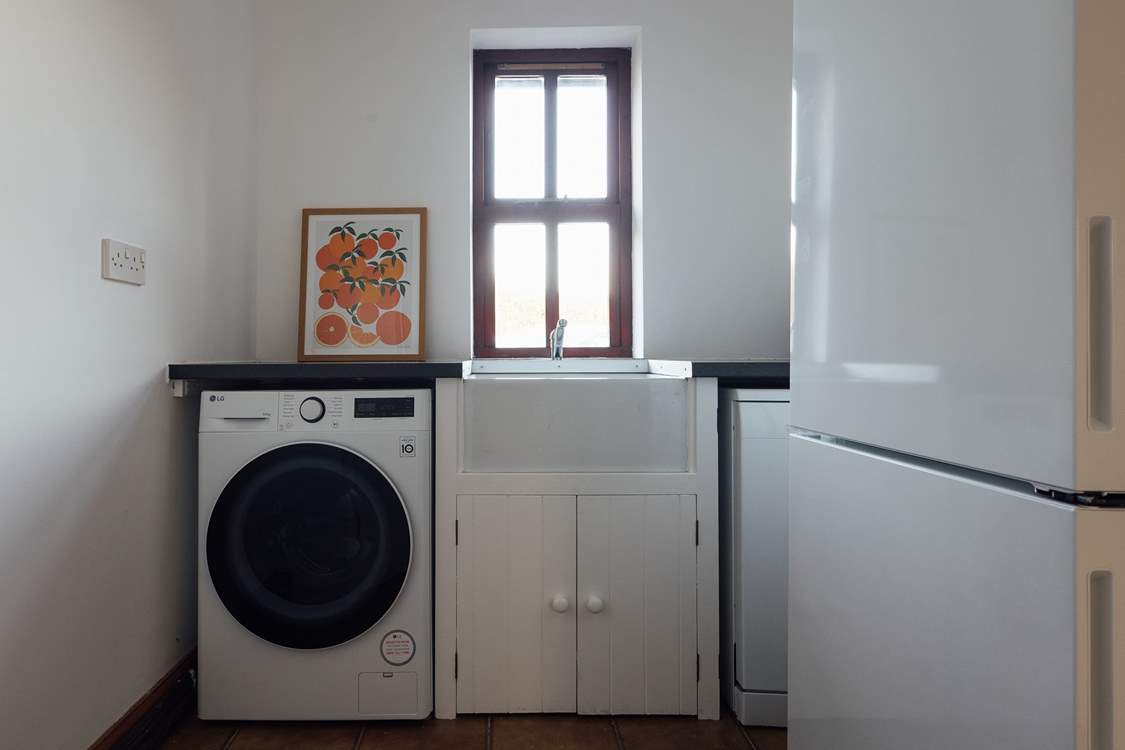 Useful utility-room with washing machine, off the boot room. A handy space for dog care, buckets and spades or muddy walking boots.