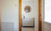 Step into one of three stylish bedrooms on the first floor.  - Thumbnail Image