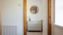 Step into one of three stylish bedrooms on the first floor. 