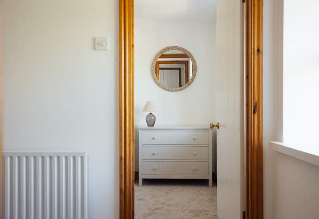 Step into one of three stylish bedrooms on the first floor. 