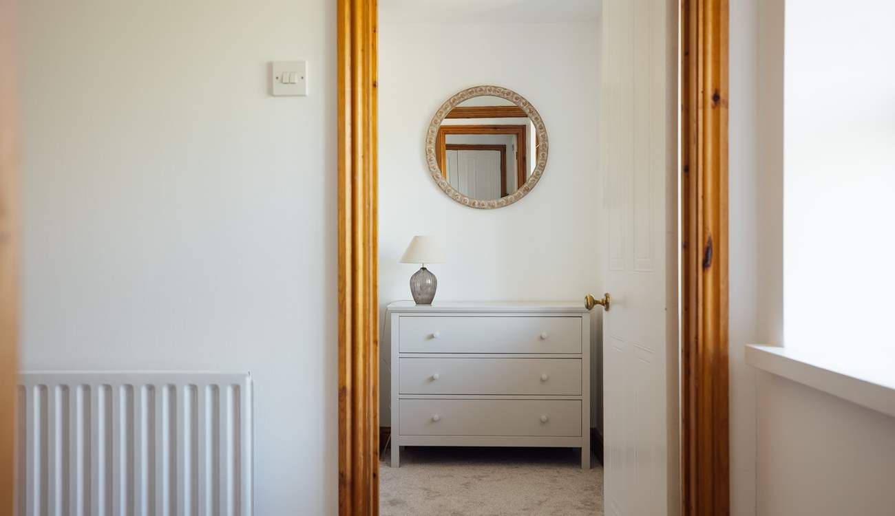 Step into one of three stylish bedrooms on the first floor. 