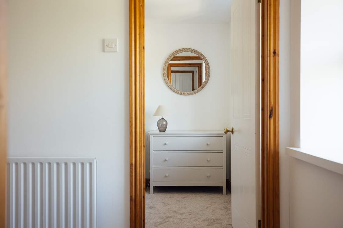 Step into one of three stylish bedrooms on the first floor.