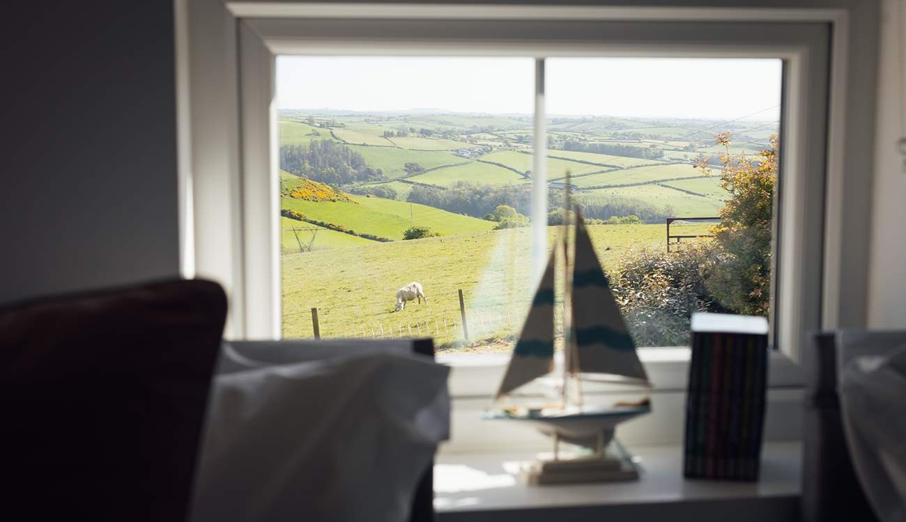 Look out over the rolling hills from the sweet twin room.