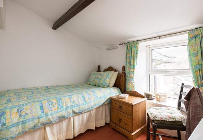 The single bedroom is ready and waiting.