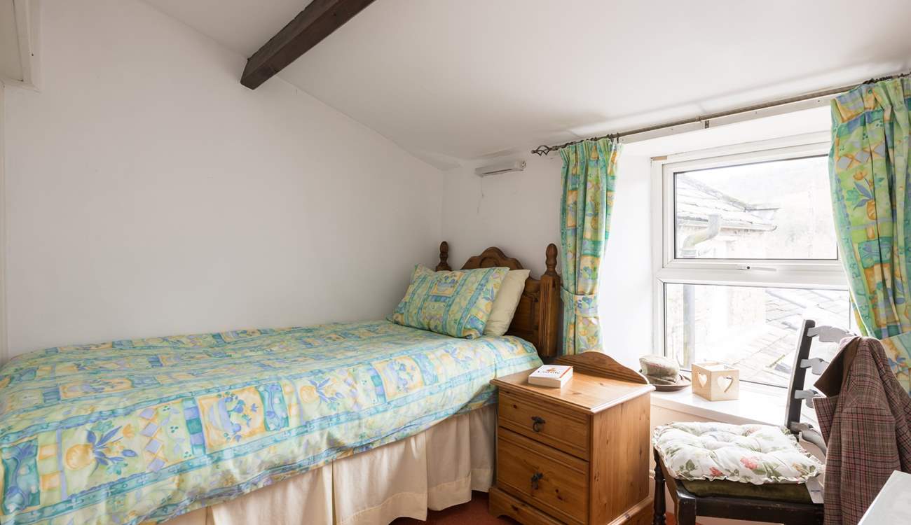 The single bedroom is ready and waiting.