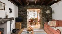 Admire the original stone walls and beams.