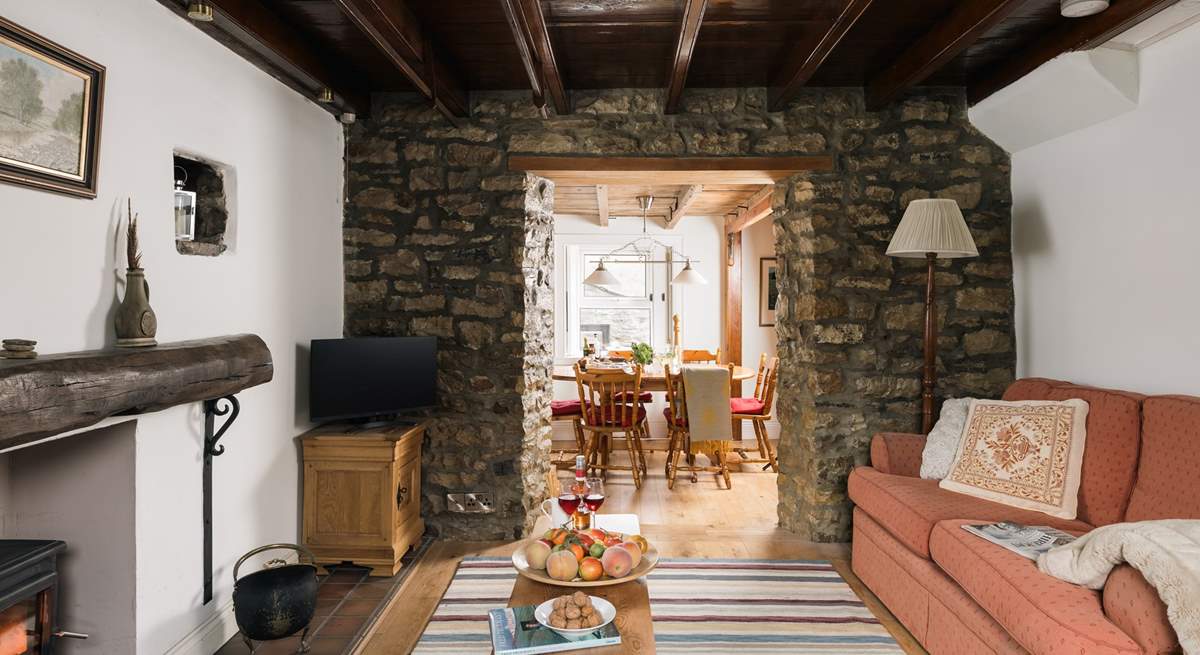 Admire the original stone walls and beams.