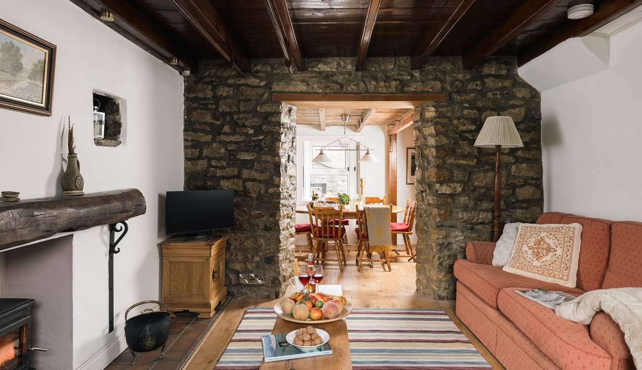Admire the original stone walls and beams.