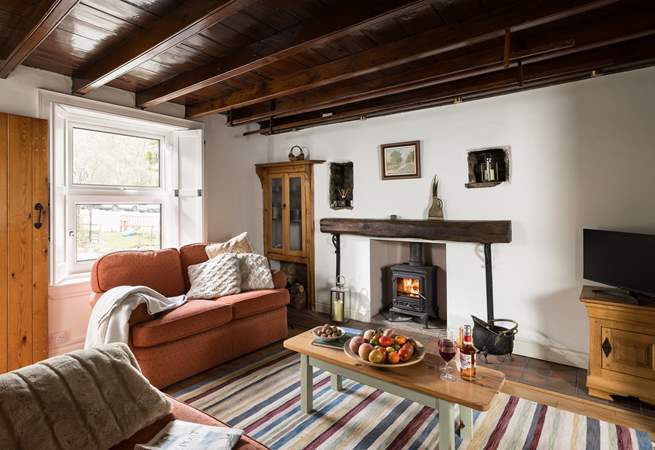 Cosy up in front of the wood-burner after a long day walking the hills.