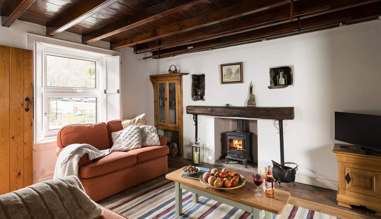 Cosy up in front of the wood-burner after a long day walking the hills.