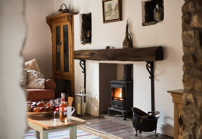 Enjoy a drink in front of the fire.