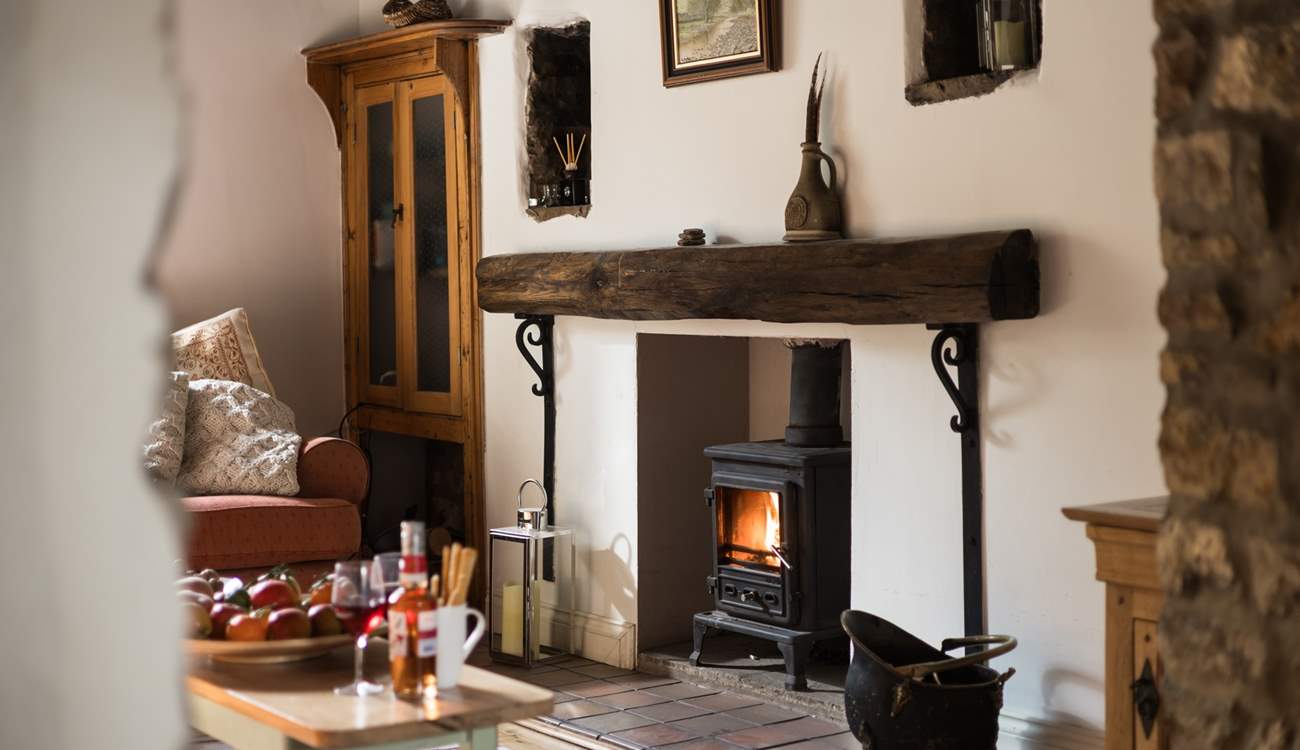 Enjoy a drink in front of the fire.