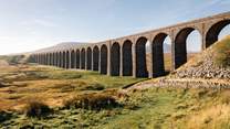 The amazing Ribblehead Viaduct stretching out over the countryside.
