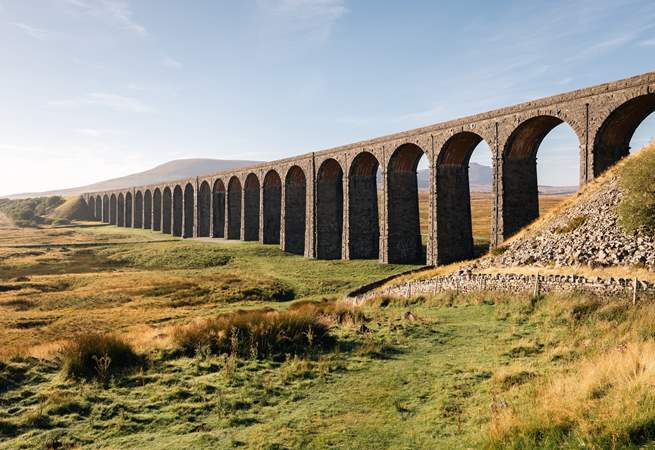 The amazing Ribblehead Viaduct stretching out over the countryside.